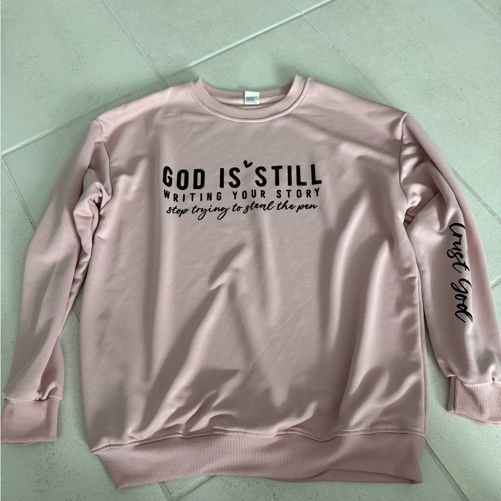God Is Still Writing Your Story Pink Crewneck Sweatshirt